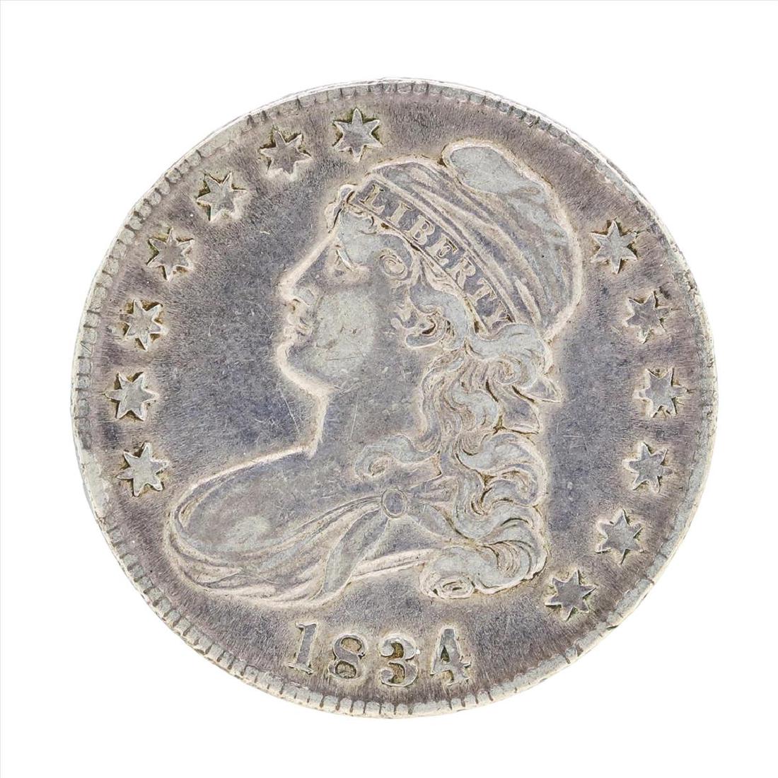 1834 Capped Bust Half Dollar Coin: One 1834 Capped Bust Half Dollar Coin.