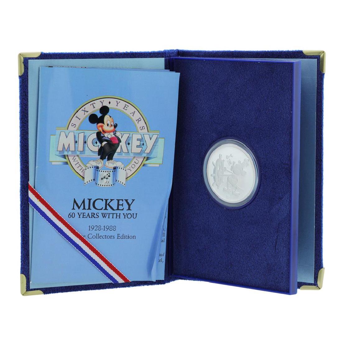 1988 Disney Rarities Mint Mickey Steamboat Willie 1 oz: One 1988 Disney Rarities Mint Mickey Steamboat Willie 1 oz Silver Commemorative Coin.