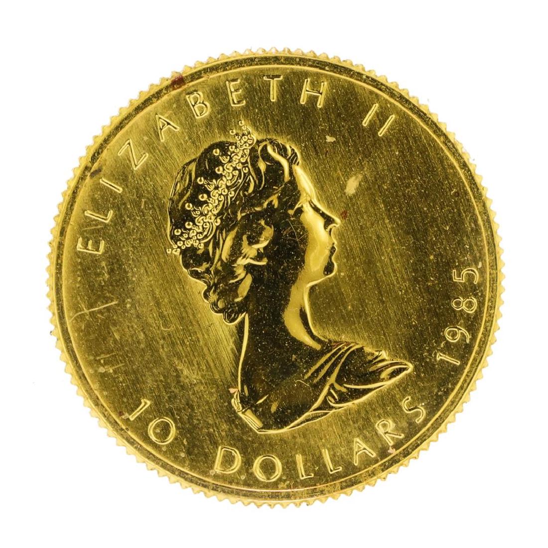 1985 $10 Canada Maples Leaf 1/4 oz. Gold Coin: One 1985 $10 Canada Maples Leaf 1/4 oz. Gold Coin.
