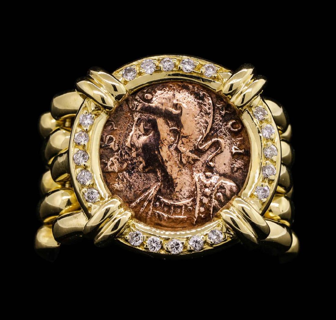 14KT Yellow Gold Coin Ring: One ring featuring: flexible panther links, a vintage copper coin and 14KT yellow gold weighing 18.6 grams containing diamonds weighing 0.20ctw. The ring is a size 8.5.