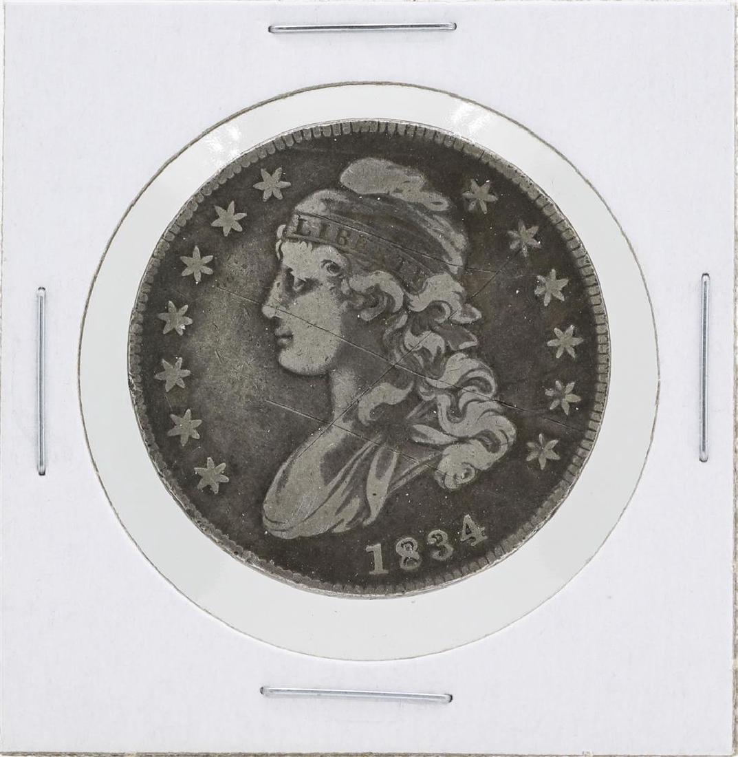 1834 Capped Bust Half Dollar Coin: One 1834 Capped Bust Half Dollar Coin.