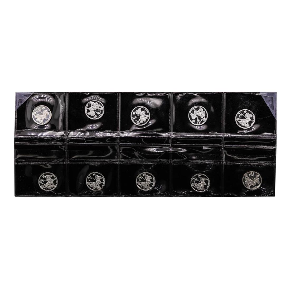 Lot of (10) Disney Mickey & Minnie Mouse Golfer 1/20: One Lot of (10) Disney Mickey & Minnie Mouse Golfer 1/20 oz. .999 Fine Silver Coin Rounds.