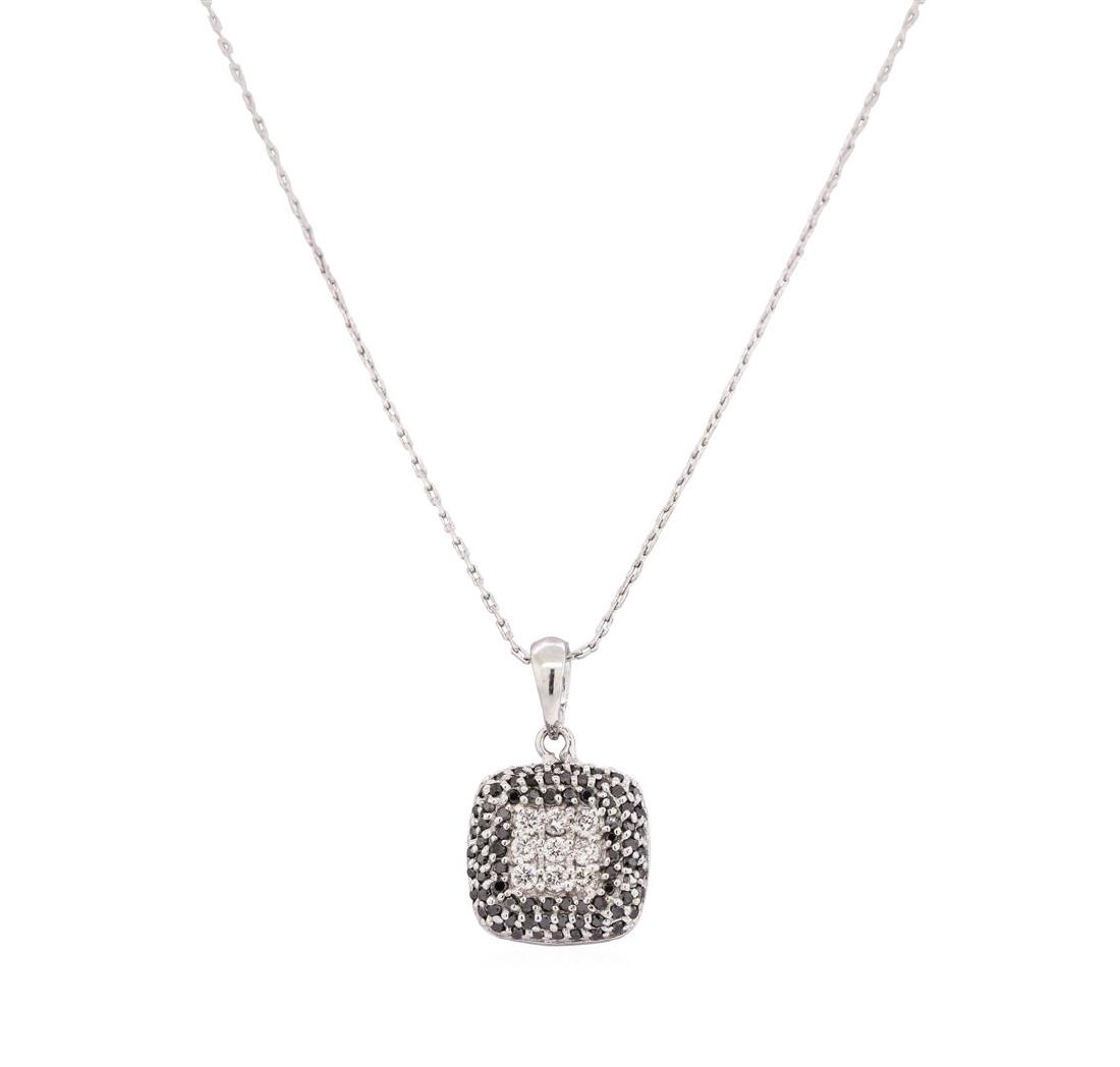 14KT White Gold 0.50ctw Black and White Diamond Pendant: One pendant with chain featuring: 14KT white gold weighing 3.4 grams containing black and white diamonds weighing 0.50ctw. The chain is an eighteen inch oval cable link.