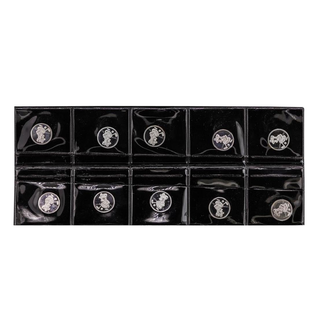 Lot of (10) Disney Mickey & Minnie Mouse Golfer 1/20: One Lot of (10) Disney Mickey & Minnie Mouse Golfer 1/20 oz. .999 Fine Silver Coin Rounds.