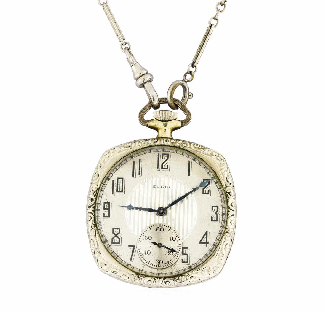Elgin Vintage Pocket Watch with Attached Watch Fob: One Elgin vintage art deco pocket watch with an attached matching watch fob featuring: 17 jewel manual wind movement, number 27063119. Dial: Cream colored with silver subdial and gunmetal pointed bato