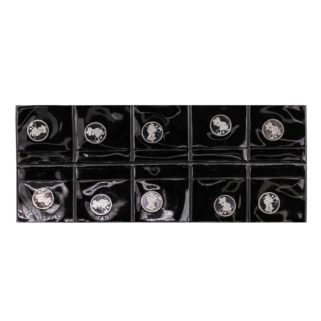 Lot of (10) Disney Mickey & Minnie Mouse Golfer 1/20: One Lot of (10) Disney Mickey & Minnie Mouse Golfer 1/20 oz. .999 Fine Silver Coin Rounds.