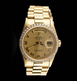 Men's 18KT Yellow Gold Rolex Diamond DayDate Watch: One gents, hand crafted & machine milled Rolex DayDate Model The President wristwatch electronically tested 18KT yellow gold, Case: 36mm oyster, Crown: twin lock with logo, Bezel: diamond set, Crystal