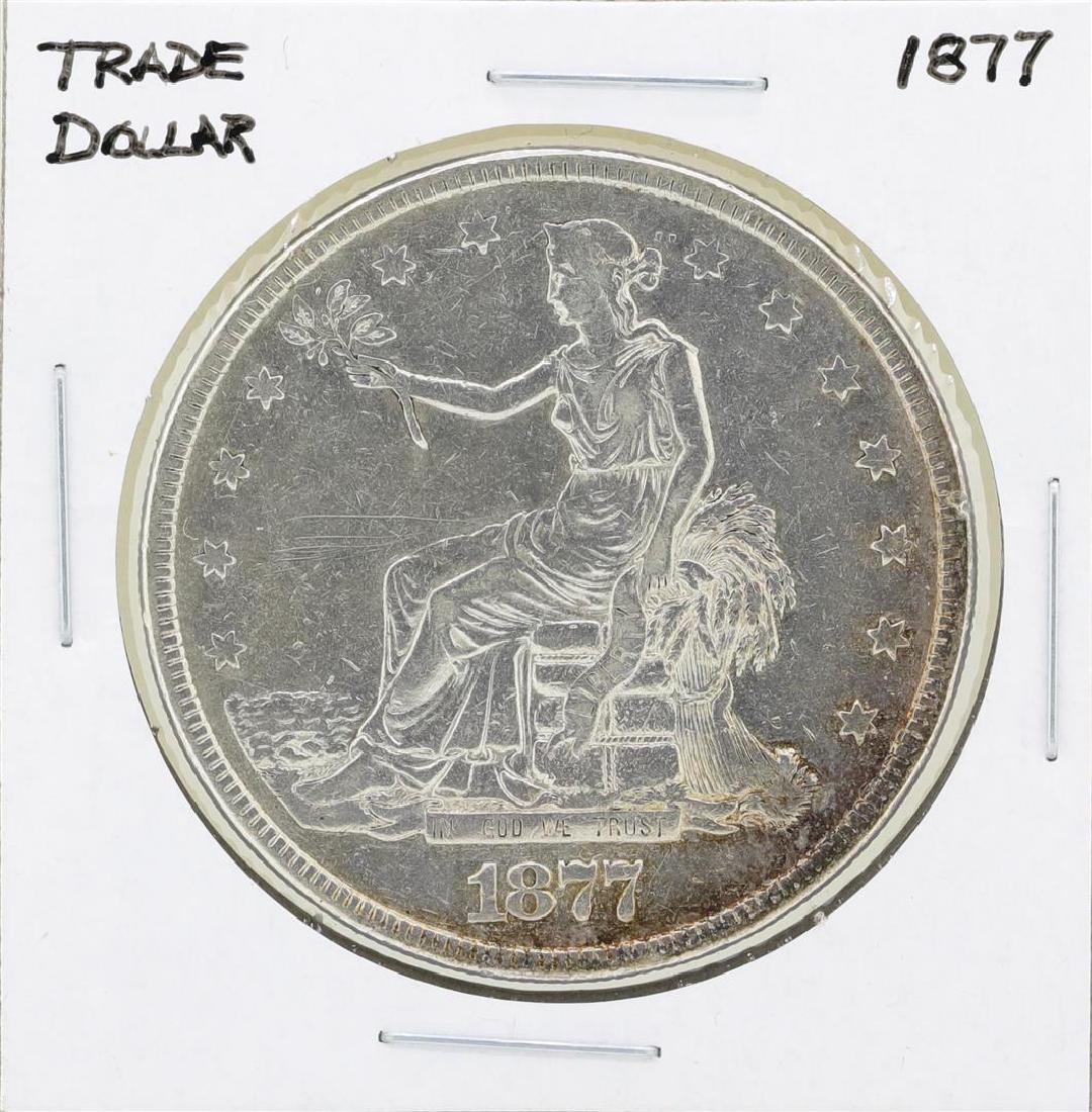 1877 $1 Trade Silver Dollar Coin: One 1877 $1 Trade Silver Dollar Coin.