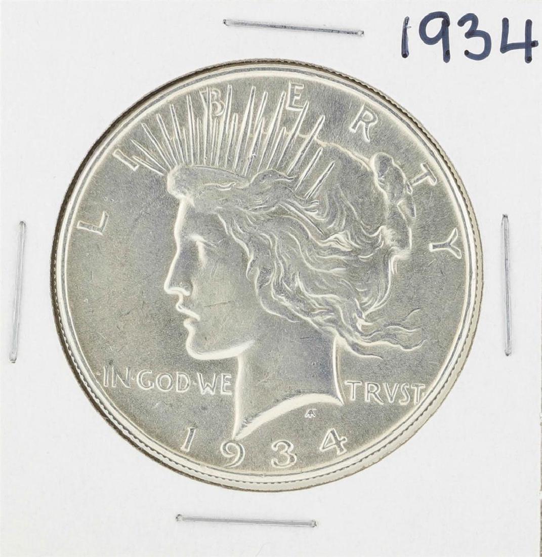 1934 $1 Peace Silver Dollar Coin: One 1934 $1 Peace Silver Dollar Coin.