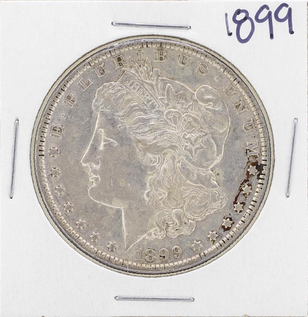 1899 $1 Morgan Silver Dollar Coin: One 1899 $1 Morgan Silver Dollar Coin.