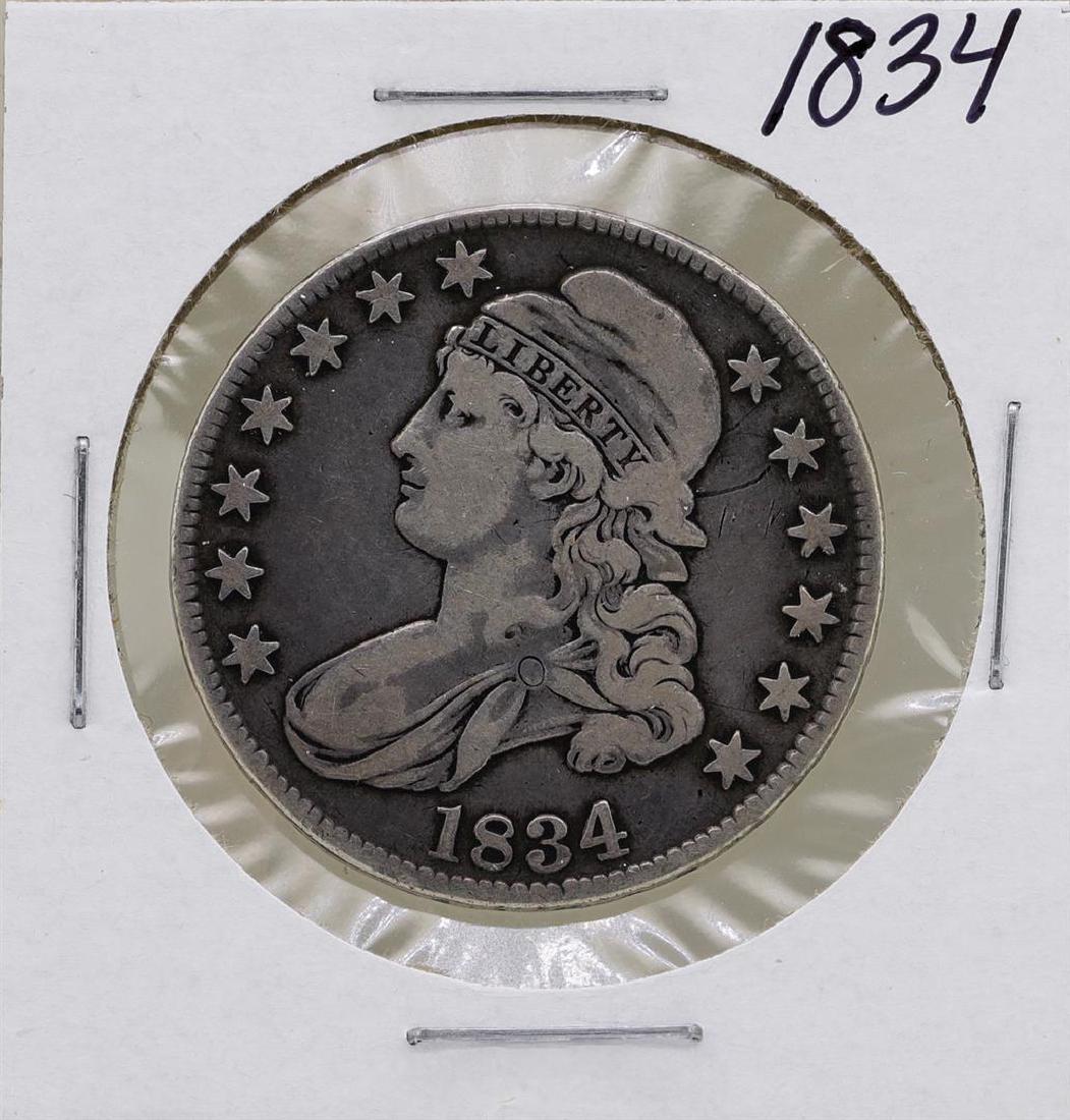 1834 Capped Bust Half Dollar Coin: One 1834 Capped Bust Half Dollar Coin.