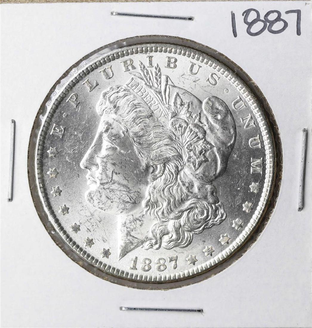 1887 $1 Morgan Silver Dollar Coin: One 1887 $1 Morgan Silver Dollar Coin.