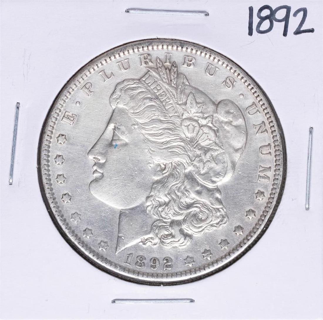 1892 $1 Morgan Silver Dollar Coin: One 1892 $1 Morgan Silver Dollar Coin.
