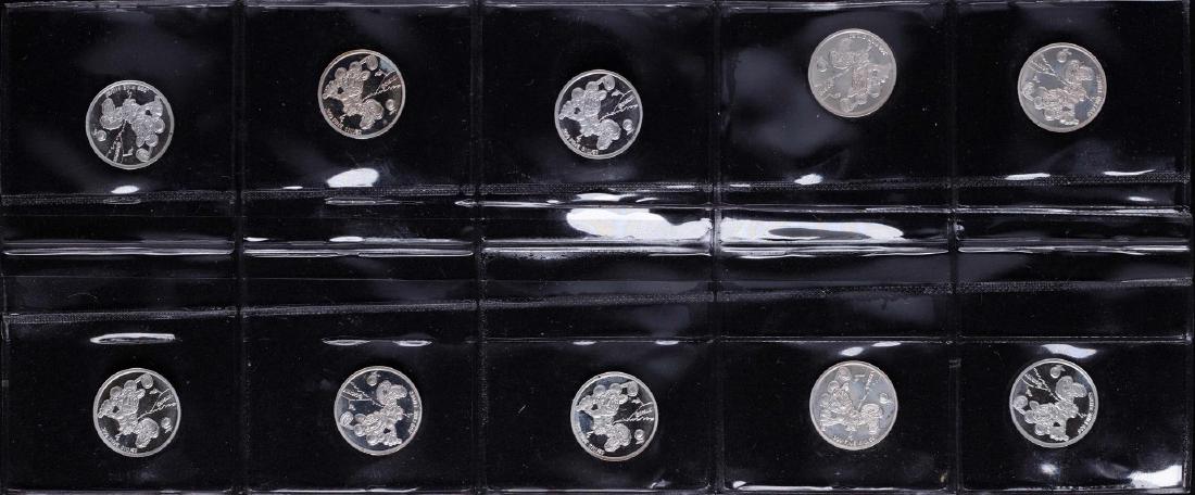 Lot of (10) Disney Mickey & Minnie Mouse Golfer 1/20: One Lot of (10) Disney Mickey & Minnie Mouse Golfer 1/20 oz. .999 Fine Silver Coin Rounds.