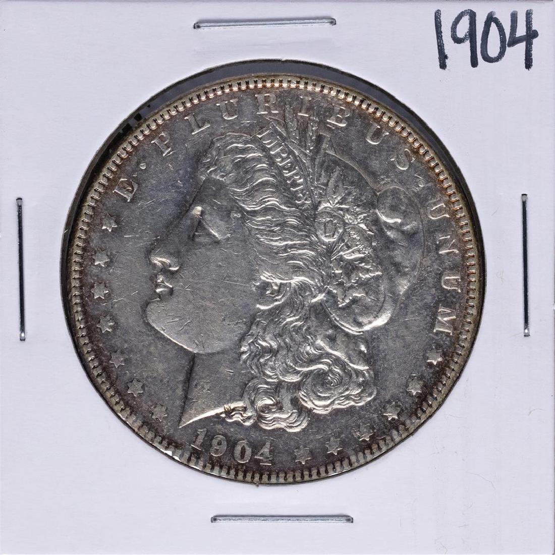 1904 $1 Morgan Silver Dollar Coin: One 1904 $1 Morgan Silver Dollar Coin.
