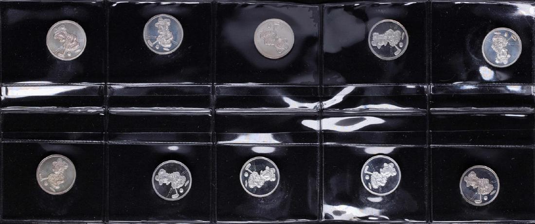 Lot of (10) Disney Mickey & Minnie Mouse Golfer 1/20: One Lot of (10) Disney Mickey & Minnie Mouse Golfer 1/20 oz. .999 Fine Silver Coin Rounds.