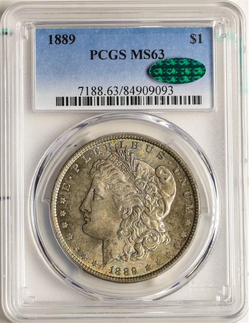 1889 $1 Morgan Silver Dollar Coin PCGS MS63 CAC AMAZING: One 1889 $1 Morgan Silver Dollar Coin PCGS MS63 CAC AMAZING TONING. PCGS Graded.