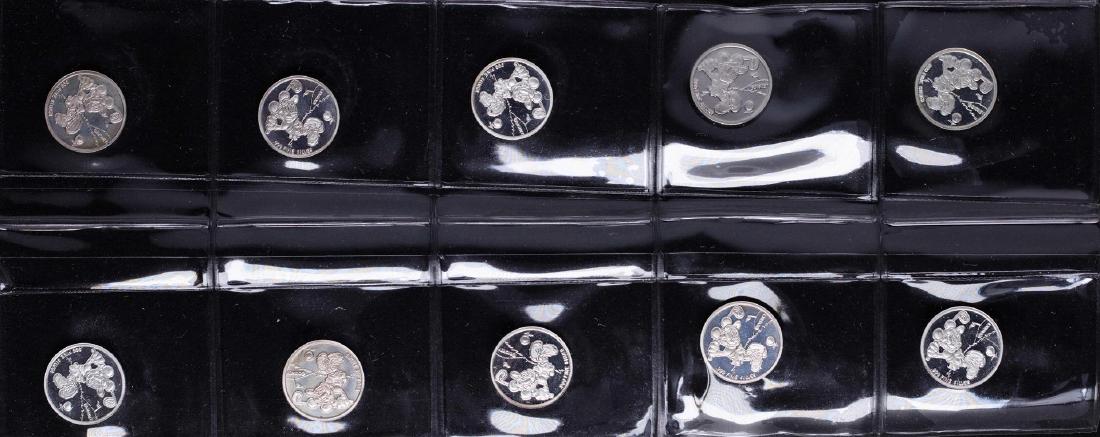 Lot of (10) Disney Mickey & Minnie Mouse Golfer 1/20: One Lot of (10) Disney Mickey & Minnie Mouse Golfer 1/20 oz. .999 Fine Silver Coin Rounds.