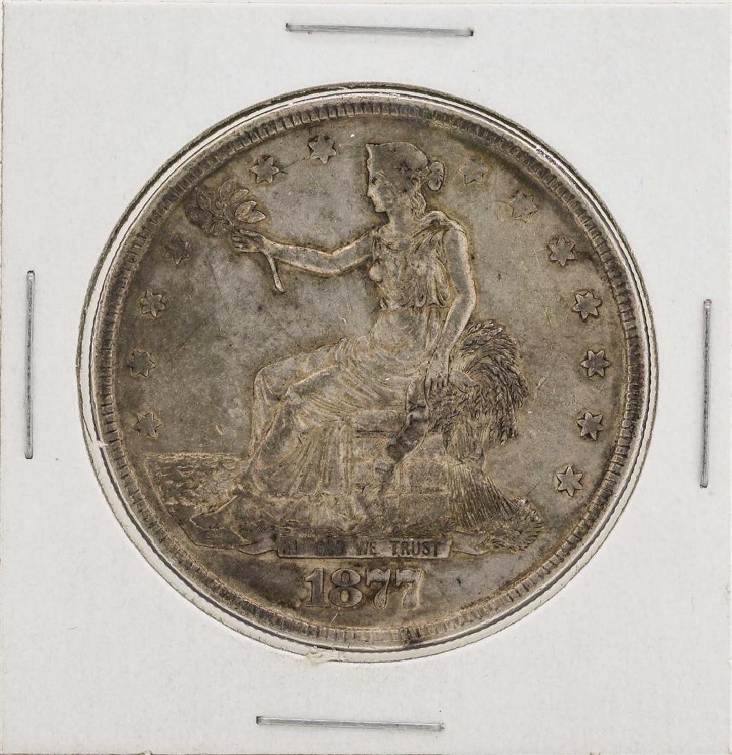 1877 $1 Trade Silver Dollar Coin: One 1877 $1 Trade Silver Dollar Coin.