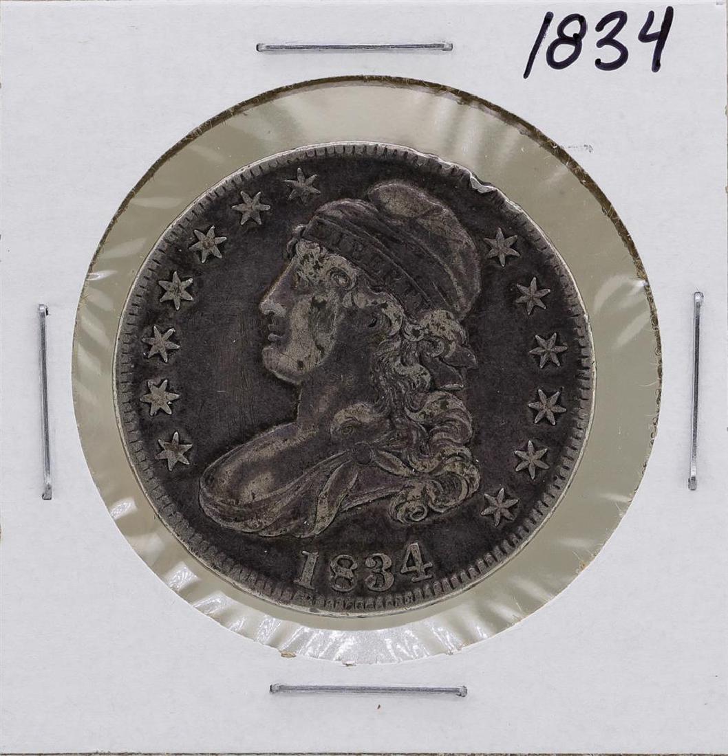 1834 Capped Bust Half Dollar Coin: One 1834 Capped Bust Half Dollar Coin.