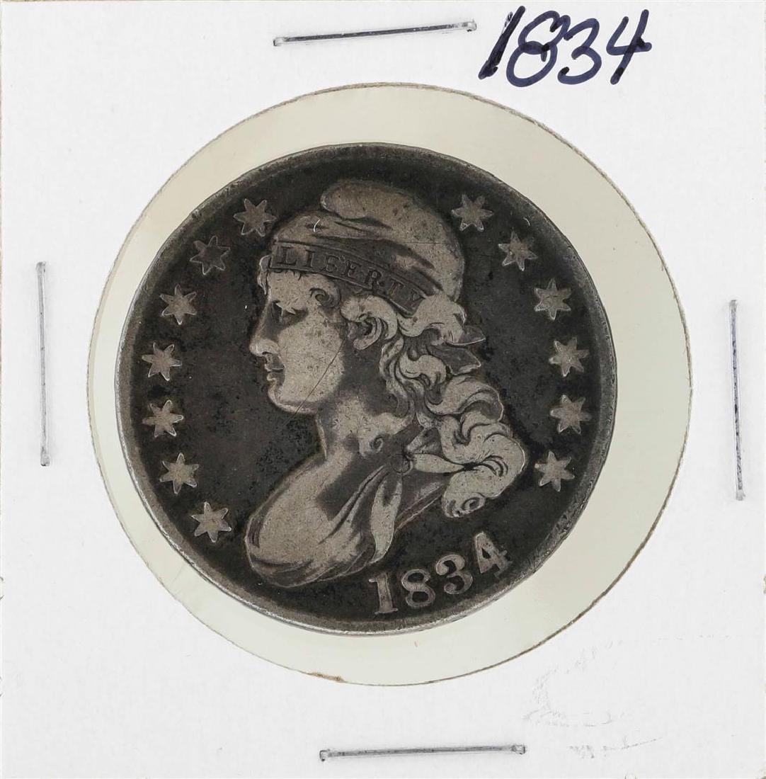 1834 Capped Bust Half Dollar Coin: One 1834 Capped Bust Half Dollar Coin.