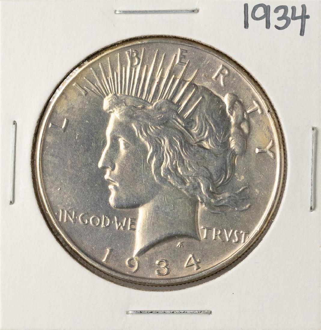 1934 $1 Peace Silver Dollar Coin: One 1934 $1 Peace Silver Dollar Coin.