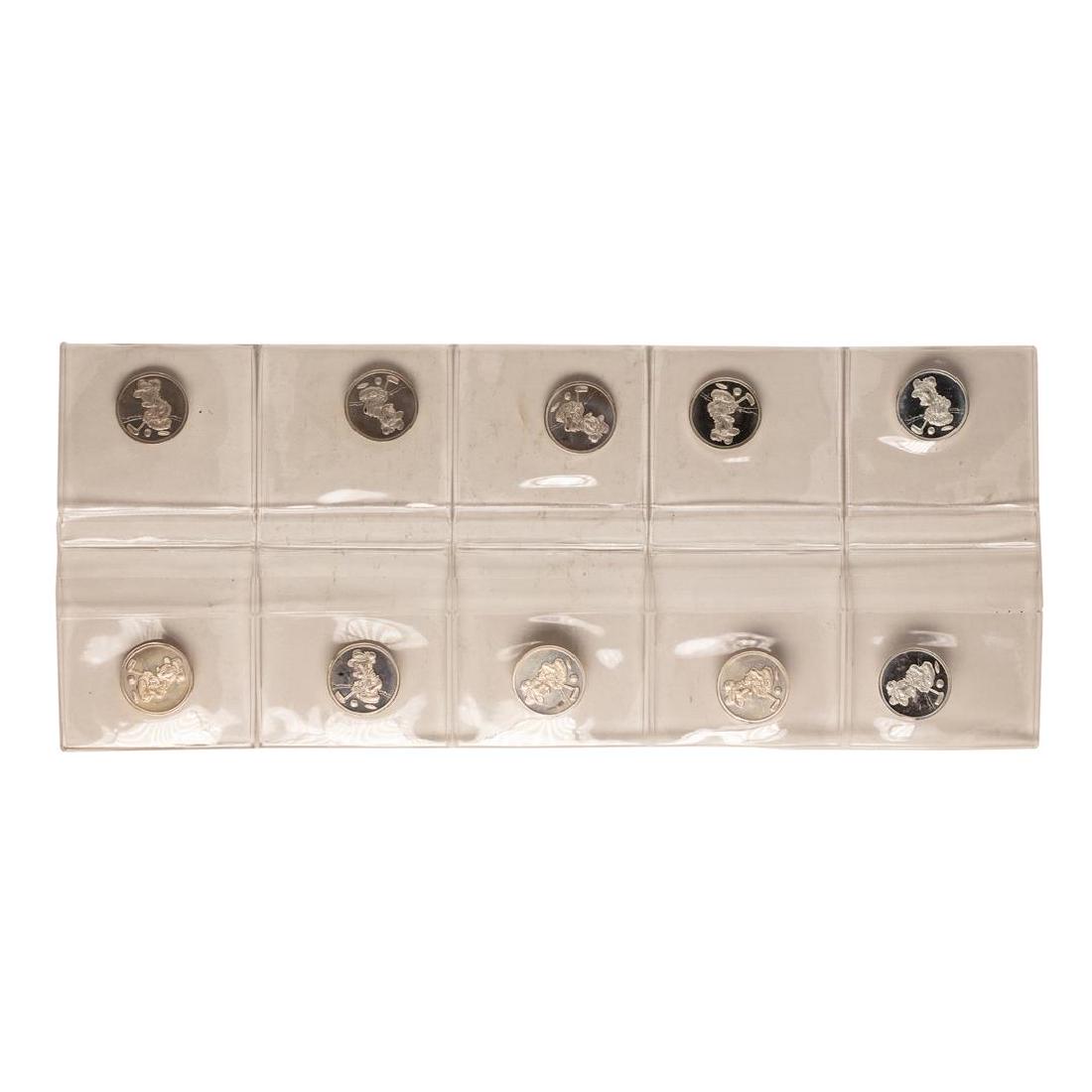 Lot of (10) Disney Mickey & Minnie Mouse Golfer 1/20: One Lot of (10) Disney Mickey & Minnie Mouse Golfer 1/20 oz. .999 Fine Silver Coin Rounds.