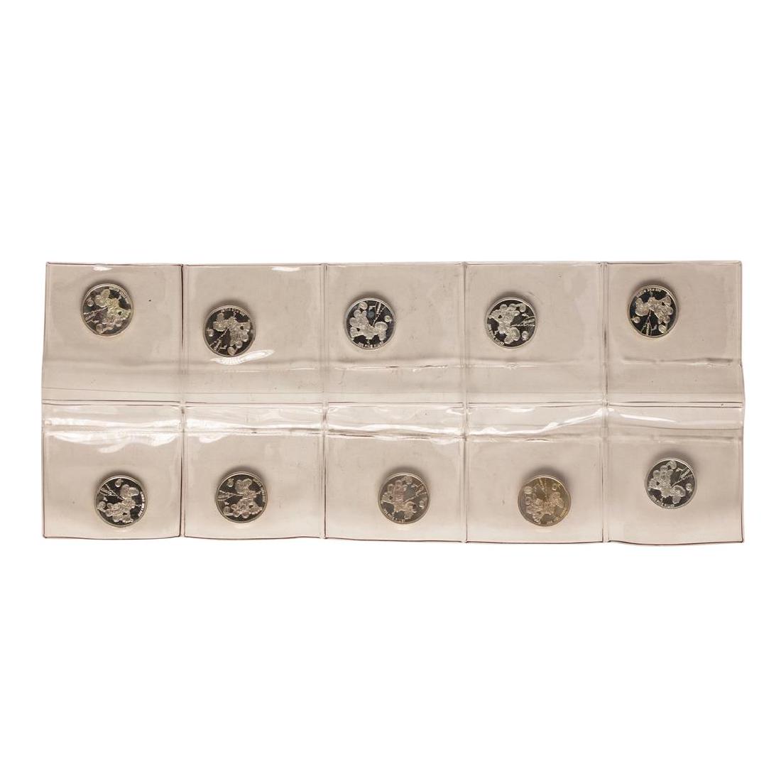 Lot of (10) Disney Mickey & Minnie Mouse Golfer 1/20: One Lot of (10) Disney Mickey & Minnie Mouse Golfer 1/20 oz. .999 Fine Silver Coin Rounds.