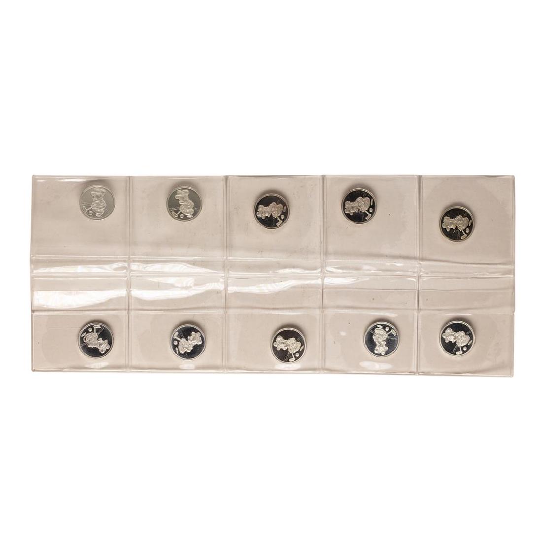 Lot of (10) Disney Mickey & Minnie Mouse Golfer 1/20: One Lot of (10) Disney Mickey & Minnie Mouse Golfer 1/20 oz. .999 Fine Silver Coin Rounds.
