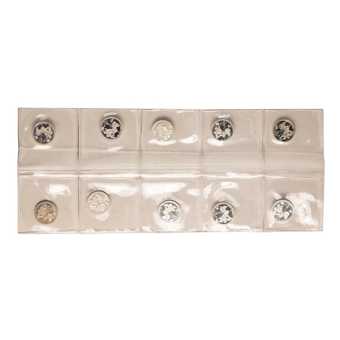 Lot of (10) Disney Mickey & Minnie Mouse Golfer 1/20: One Lot of (10) Disney Mickey & Minnie Mouse Golfer 1/20 oz. .999 Fine Silver Coin Rounds.