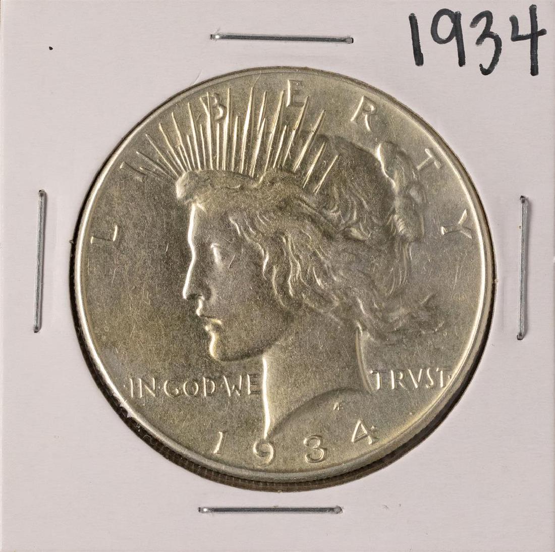 1934 $1 Peace Silver Dollar Coin: One 1934 $1 Peace Silver Dollar Coin.
