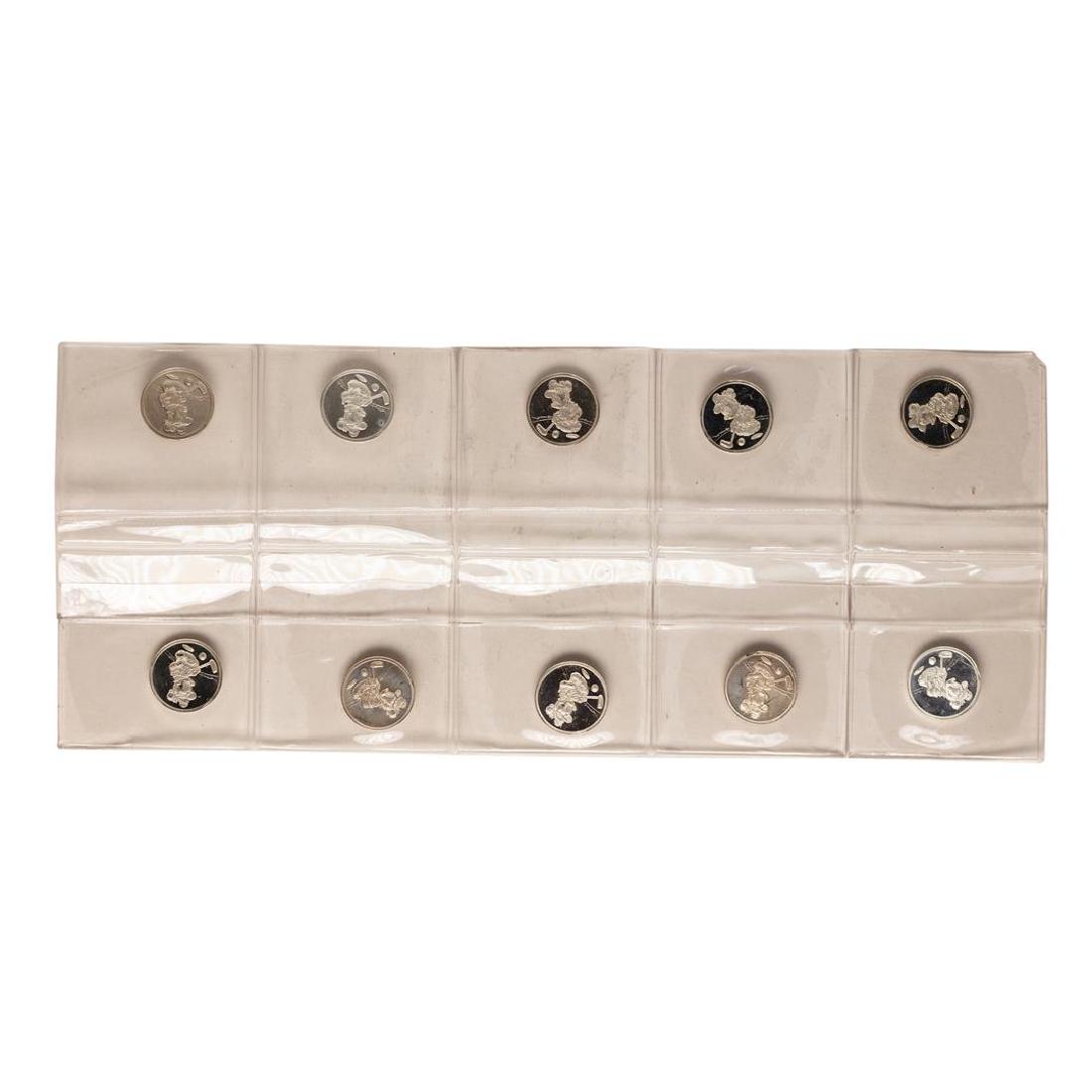 Lot of (10) Disney Mickey & Minnie Mouse Golfer 1/20: One Lot of (10) Disney Mickey & Minnie Mouse Golfer 1/20 oz. .999 Fine Silver Coin Rounds.
