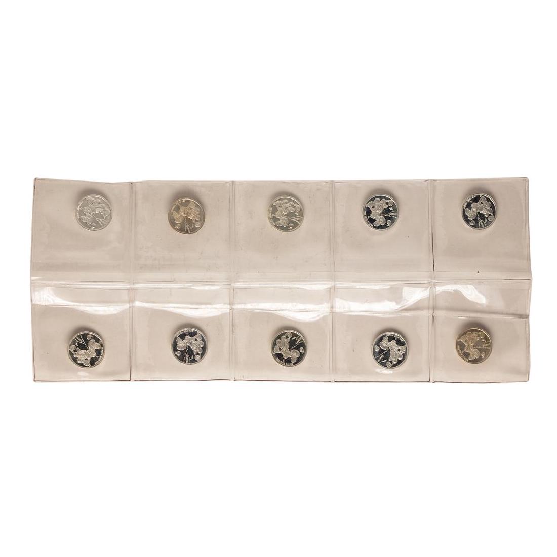 Lot of (10) Disney Mickey & Minnie Mouse Golfer 1/20: One Lot of (10) Disney Mickey & Minnie Mouse Golfer 1/20 oz. .999 Fine Silver Coin Rounds.