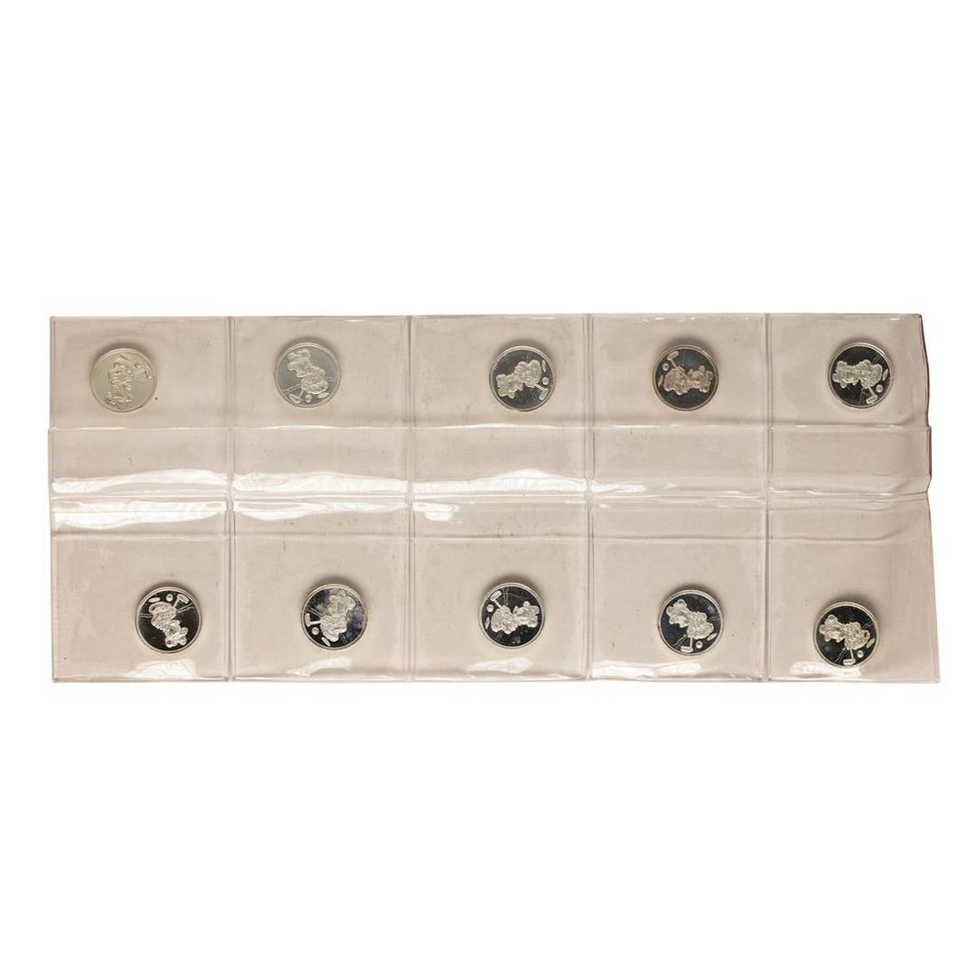 Lot of (10) Disney Mickey & Minnie Mouse Golfer 1/20: One Lot of (10) Disney Mickey & Minnie Mouse Golfer 1/20 oz. .999 Fine Silver Coin Rounds.