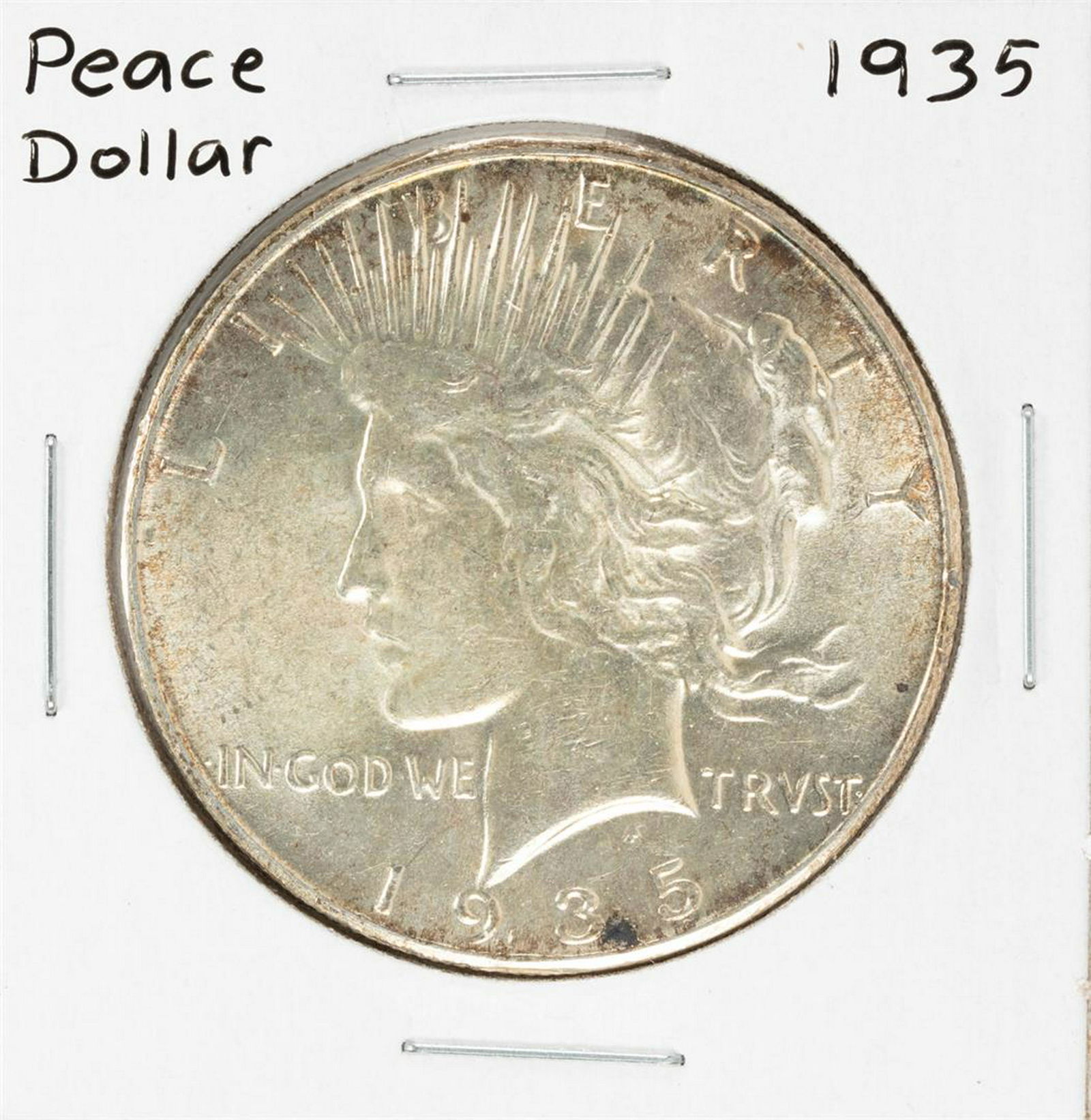 1935 $1 Peace Silver Dollar Coin: One 1935 $1 Peace Silver Dollar Coin.