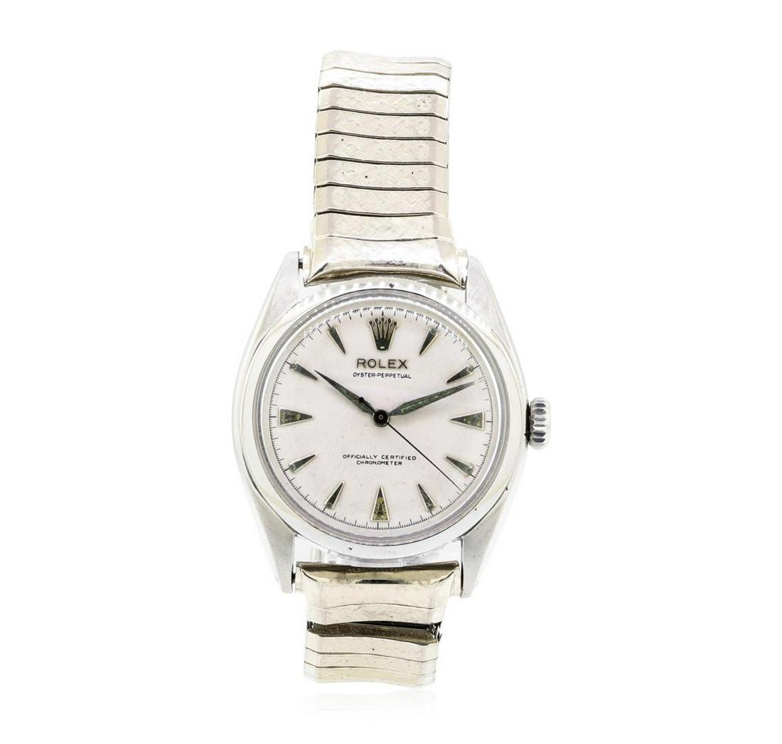 Stainless Steel Men's Rolex Oyster Perpetual Wristwatch: One Men's, hand crafted and machine milled Rolex Oyster perpetual wrist watch electronically tested stainless steel, Serial#: 875346, Crown: pull-out, Bezel: polished, bright, Crystal: acrylic, Moveme