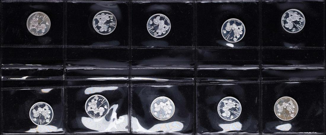 Lot of (10) Disney Mickey & Minnie Mouse Golfer 1/20: One Lot of (10) Disney Mickey & Minnie Mouse Golfer 1/20 oz. .999 Fine Silver Coin Rounds.