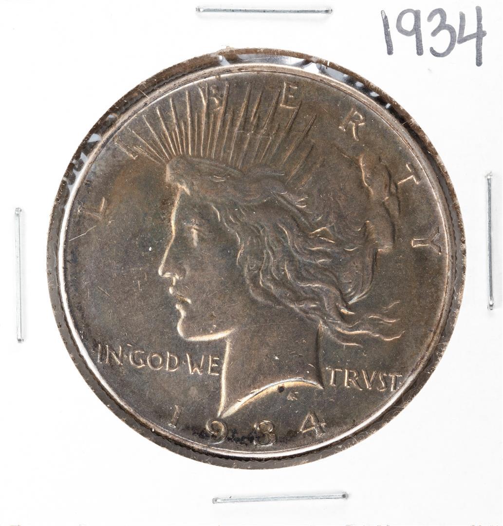 1934 $1 Peace Silver Dollar Coin: One 1934 $1 Peace Silver Dollar Coin.