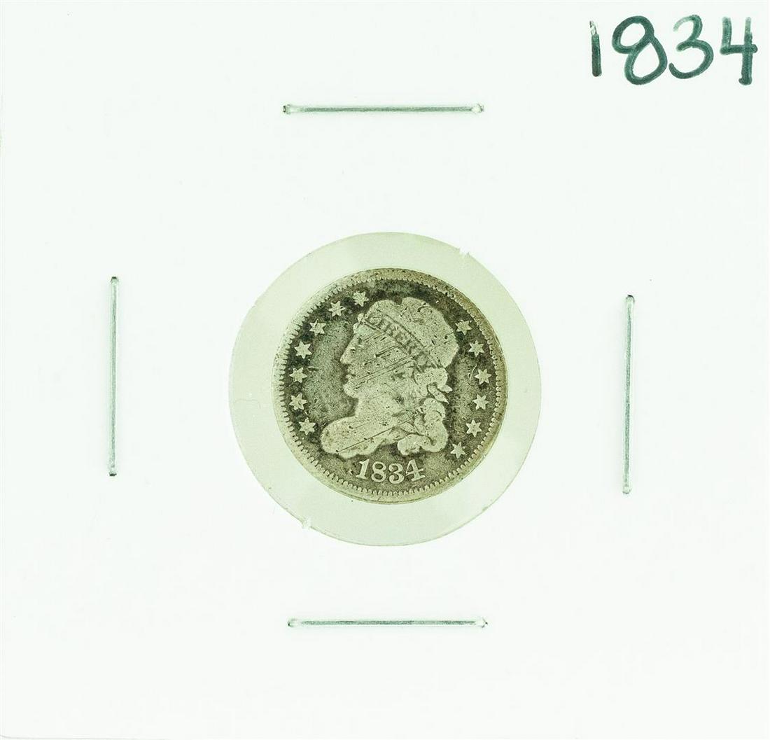 1834 Capped Bust Half Dime Coin: One 1834 Capped Bust Half Dime Coin.