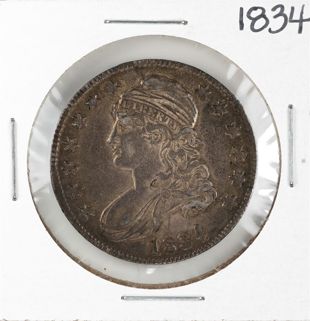 1834 Capped Bust Half Dollar Coin: One 1834 Capped Bust Half Dollar Coin.