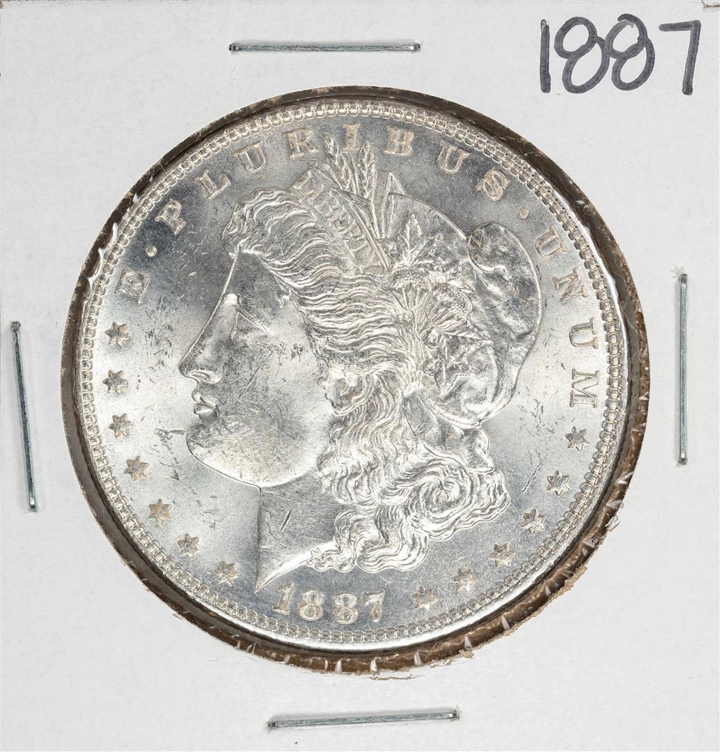 1887 $1 Morgan Silver Dollar Coin: One 1887 $1 Morgan Silver Dollar Coin.