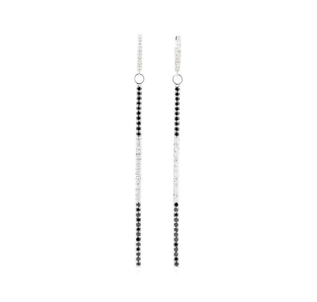 14KT White Gold 0.89 ctw Black and White Diamond: One pair electronically tested 14KT white gold Ladies combination cast & assembled fashion dangle earrings with hinged clip backs with a bright polish finish. The featured Ladies earrings have a drop