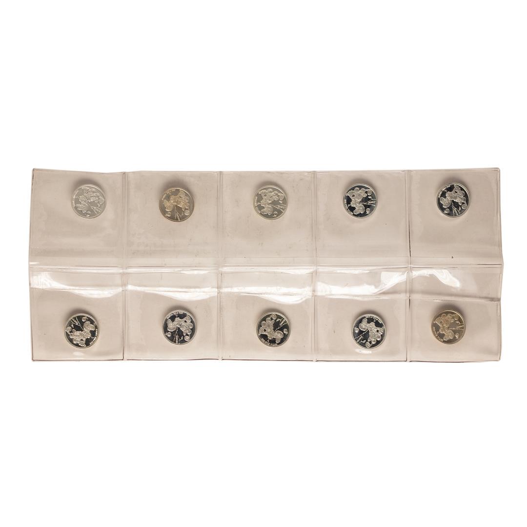 Lot of (10) Disney Mickey & Minnie Mouse Golfer 1/20: One Lot of (10) Disney Mickey & Minnie Mouse Golfer 1/20 oz. .999 Fine Silver Coin Rounds.