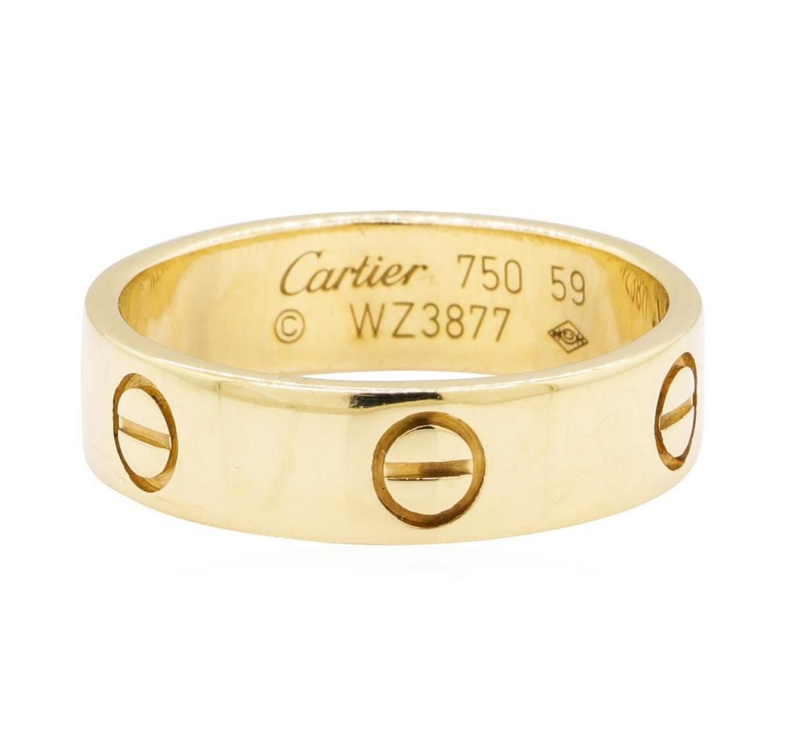 Cartier 18KT Yellow Gold Love Ring: One Cartier love ring featuring: 18KT yellow gold weighing 8.5 grams. The ring is engraved with serial number WZ3877. The ring is American size 8, European size 59.