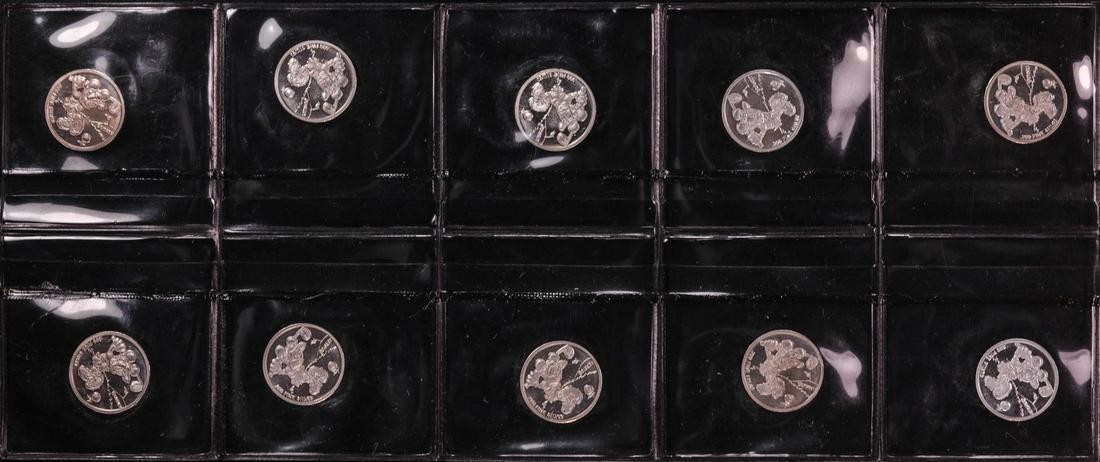 Lot of (10) Disney Mickey & Minnie Mouse Golfer 1/20: One Lot of (10) Disney Mickey & Minnie Mouse Golfer 1/20 oz. .999 Fine Silver Coin Rounds.