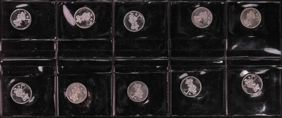 Lot of (10) Disney Mickey & Minnie Mouse Golfer 1/20: One Lot of (10) Disney Mickey & Minnie Mouse Golfer 1/20 oz. .999 Fine Silver Coin Rounds.