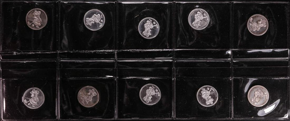 Lot of (10) Disney Mickey & Minnie Mouse Golfer 1/20: One Lot of (10) Disney Mickey & Minnie Mouse Golfer 1/20 oz. .999 Fine Silver Coin Rounds.
