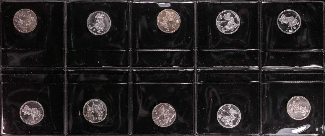 Lot of (10) Disney Mickey & Minnie Mouse Golfer 1/20: One Lot of (10) Disney Mickey & Minnie Mouse Golfer 1/20 oz. .999 Fine Silver Coin Rounds.