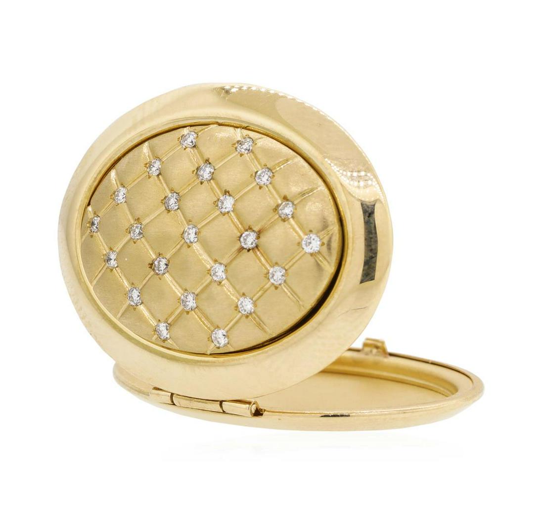 14KT Yellow Gold 0.25ctw Diamond Locket: One locket featuring: 14KT yellow gold weighing 9.1 grams containing diamonds weighing 0.25ctw. The locket measures approximately 40 millimeters in length.