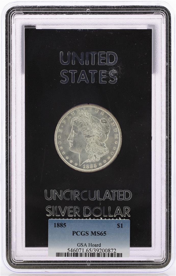 1885-P $1 Morgan Silver Dollar Coin GSA Hoard PCGS MS65: One 1885-P $1 Morgan Silver Dollar Coin GSA Hoard PCGS MS65, note there is a small hairline crack as shown on the reverse of the original GSA holder. PCGS Graded.